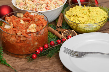 Traditional Christmas fish salads on the Christmas Eve table, traditional Polish dishes for Christmas