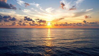 Naklejka premium Sunset over calm ocean water