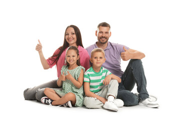 Happy family showing thumbs ups on white background