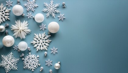 White snowflake decorations and white glass balls on pale blue background with copy space. Generated image