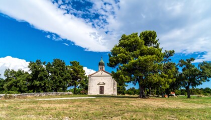 Picturesque church nestled in a sunny landscape