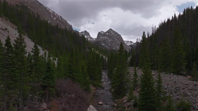 Huerfano River valley Blanca Peak Mt Mount Lindsey Lily Lake trail Sangre de Cristo Range Colorado aerial drone spring Summer San Isabel forest Iron Nip ple Rocky Mountains gray clouds forward motion