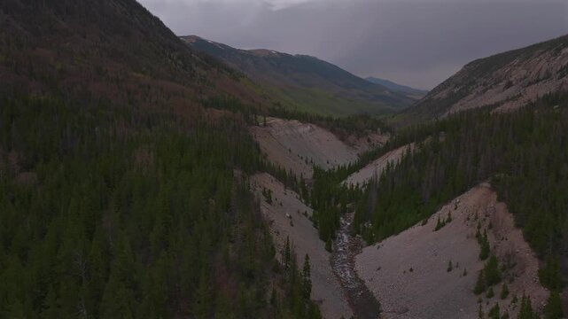 Huerfano River valley Blanca Peak Mt Mount Lindsey Lily Lake trail Sangre de Cristo Range Colorado aerial drone spring Summer San Isabel forest Iron Nip ple Rocky Mountains gray clouds forward