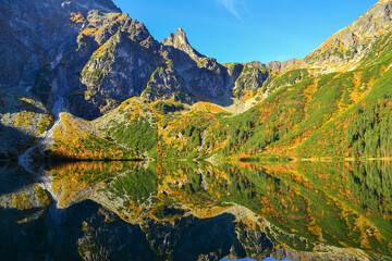 Autumn view of Morskie Oko lake and Mnich mountain, High Tatras, Zakopane, Poland © Aneta