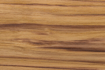 Teak wood texture with natural golden brown grain and smooth surface