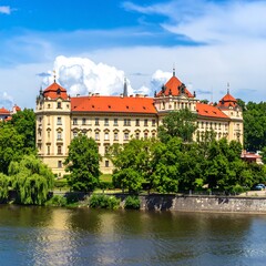 Picturesque European palace by a river