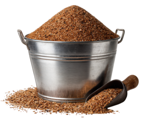 Metal bucket filled with poultry feed, grain, and seeds, with scoop beside it, isolated on transparency background, representing farm supply and animal nutrition