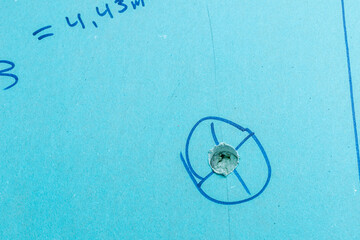 Thermal insulation adhesive was poured into the drywall openings in the house being renovated.