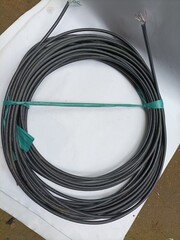 black cable roll on white board