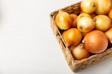 Onion on the kitchen table. onion slice. onion rings. Fresh Yellow Onion. Natural, fresh, vegetarian food. Agricultural products. Healthy eating. Vegetables. Farmer's market. Space for text.Copy space