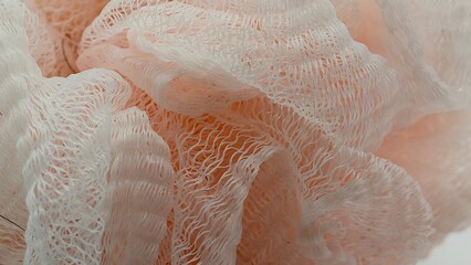 pink abstract shower puff, shower sponge texture background