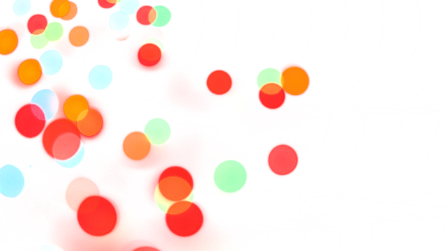 Colorful shiny glowing bokeh light overlay effect on transparent background design element