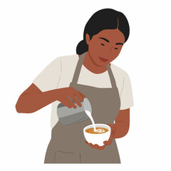 Focused barista pouring steamed milk from a pitcher to create latte art in a coffee mug, isolated on a white background