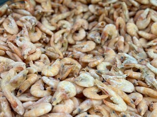 Indulge in a Fresh Shrimp Pile that is Perfectly Crafted for Seafood Lovers Everywhere. A vibrant and tempting pile of fresh shrimp, just waiting to be transformed into delicious seafood dishes