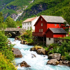 Picturesque mountain village by a rushing river