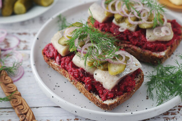 Scandinavian sandwiches with herring and beetroot	