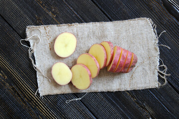 Fresh Young potatoes on a wooden background
