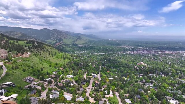 Chautauqua Park front range town of Boulder Colorado college University city summer spring aerial drone Pearl Street Mall Eben G Fine Park Boulder creek Flatirons Green mountain blue sky sunny forward