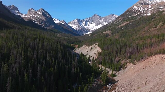 Huerfano River valley Blanca Peak Mt Mount Lindsey Lily Lake trail Sangre de Cristo Range Colorado aerial drone spring Summer San Isabel forest Iron Nip ple Rocky Mountains blue sky sunny forward pan