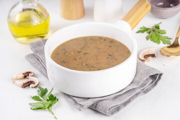 Delicious tasty champignons mushrooms cream soup. Creamy pureed vegetable soup with mushrooms,...