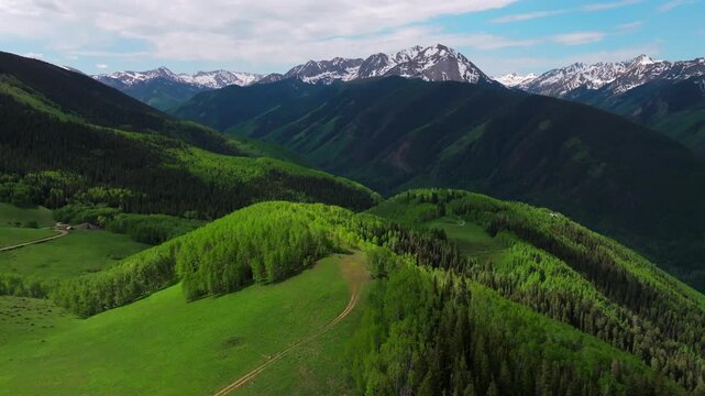 AJAX Aspen Mountain backcountry spring summer Rocky Mountain Conundrum Creek Castle Peak aerial drone Ashcroft Little Annie Trail Basin 4wd road morning blue sky cabins Aspen trees grove forward