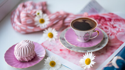 Elegant pink dessert display featuring delicious cakes, aromatic coffee, and floral decorations, creating a delightful atmosphere for enjoying sweet treats and beverages with copy space