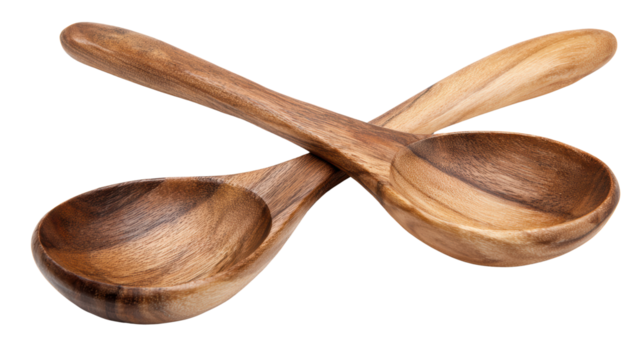 Two elegant wooden spoons crossed on a white background, showcasing craftsmanship and style.