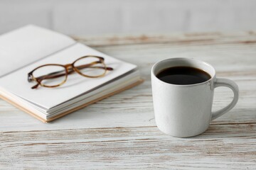 Simple coffee and book still life