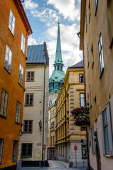 Historic Stockholm Alley with Church Spire View