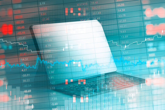 Modern laptop computer with keyboard overlaid with financial market data, stock charts, and trading numbers in red and blue colors. Concept online trading. - Powered by Adobe