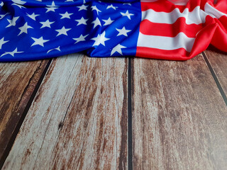 US flag on wooden table