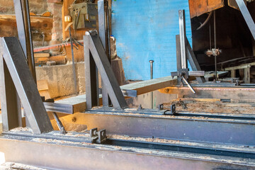 Face milling tools with carbide inserts ready to work on a metal plate.