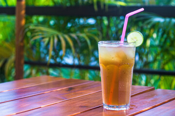 Iced lemon tea on a wooden table