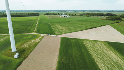Jeep driving on grassy farmland