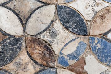 Fototapeta premium Antique stone mosaic floor aged design detail aged texture