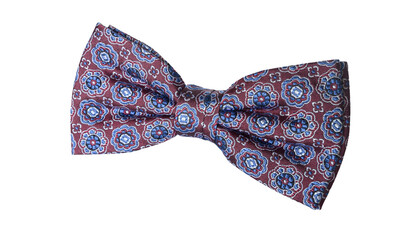 Elegant bow tie in royal red and floral motifs isolated on a white background.