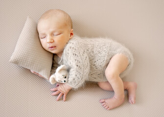 Newborn Baby With Toy At A Photoshoot