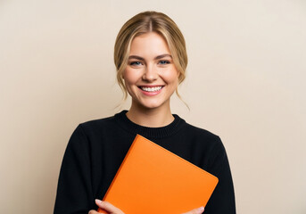 Portrait of smiling blonde woman holding orange folder for business or education