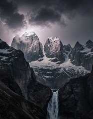 A dramatic mountain landscape under a stormy sky, with lightning striking the peaks and a cascading waterfall carving through the rugged terrain