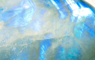 Beautiful close up of quartz crystal rock shard with reflective rainbow spiritual light