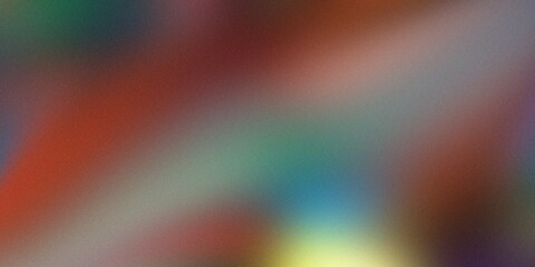 An abstract background featuring a dynamic blend of red, green, and blue hues with a textured, slightly blurred effect