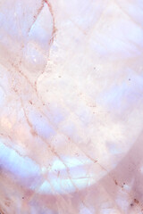 Beautiful close up of quartz crystal rock shard with reflective rainbow spiritual light