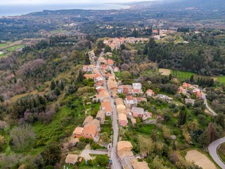 Obraz premium Aerial view of a picturesque village in Corfu, Greece.