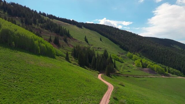 Richmond Hill Little Annie Trailhead Aspen Mountain AJAX summer spring morning blue sky camping aerial drone Colorado mountain cabin hillside 4wd trail road Ashcroft Conundrum peak creek circle right