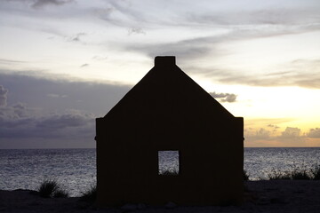 Bonaire, Kralendijk - aerial view over Red Slave (Peleké) huts at sunset in beautiful light
