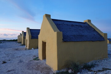 Bonaire, Kralendijk - aerial view over Red Slave (Peleké) huts at sunset in beautiful light
