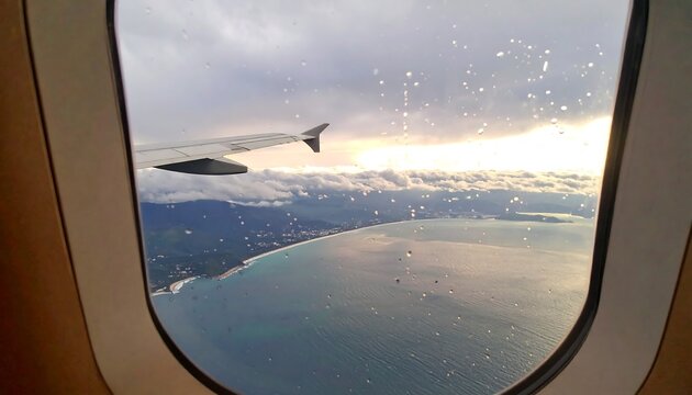 Aerial view of coastal landscape from airplane window