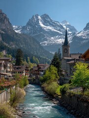 Fototapeta premium Scenic alpine village nestled beside a river, mountains in the background