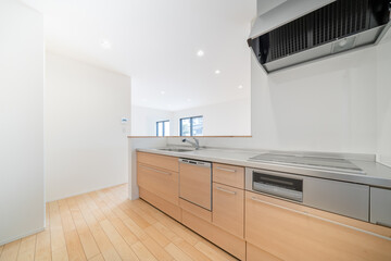 Modern system kitchen with wooden cabinets ― 木目調キャビネットのモダンシステムキッチン