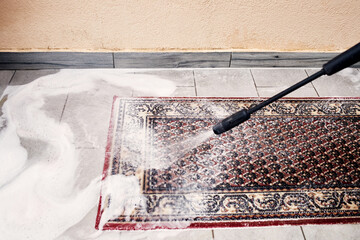 Cleaning an Outdoor Rug with a Pressure Washer